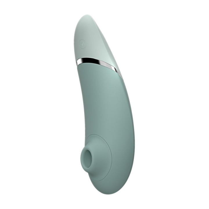 WOMANIZER Clitoriskeuhdistin suhnuttaen ja vibreroimalla