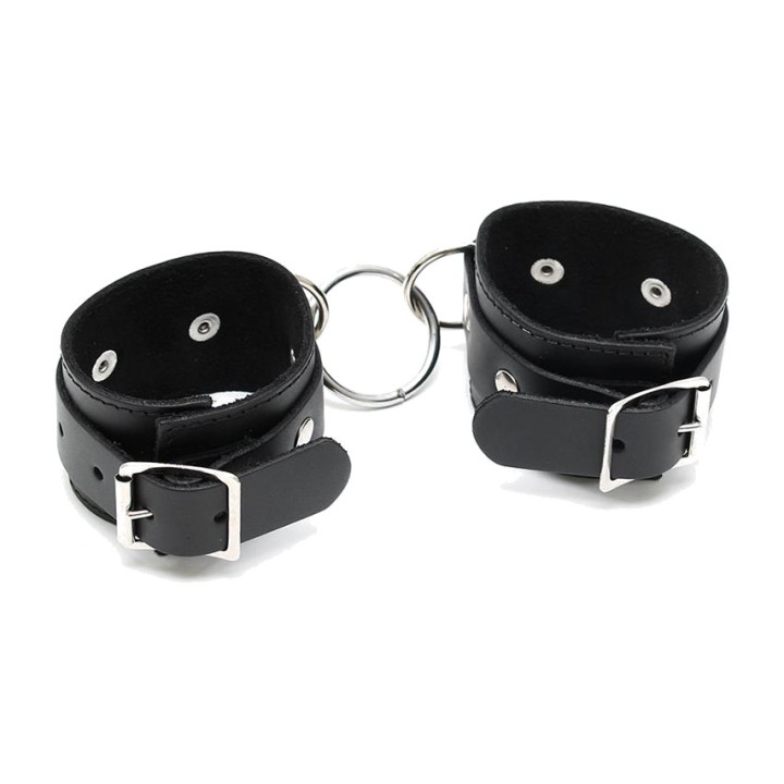 BONDAGE PLAY Algemas de couro com argola central R7614